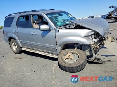 Czwarte zdjęcie samochodu z boku: 2002 TOYOTA SEQUOIA SR5 VIN:5TDZT34A22S118375 - miniatura