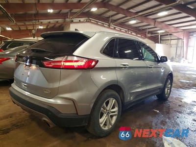 Trzecie zdjęcie samochodu z tyłu: 2020 FORD EDGE SEL VIN:2FMPK4J99LBB33075 - miniatura