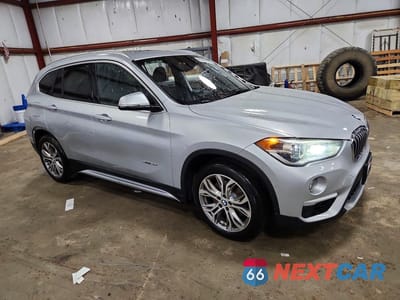 Czwarte zdjęcie samochodu z boku: 2016 BMW X1 XDRIVE28I VIN:WBXHT3Z36G4A50497 - miniatura