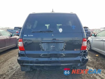 Zdjęcie 6 z 12 samochodu: 2003 MERCEDES-BENZ ML 320 VIN:4JGAB54E33A384092 - miniatura