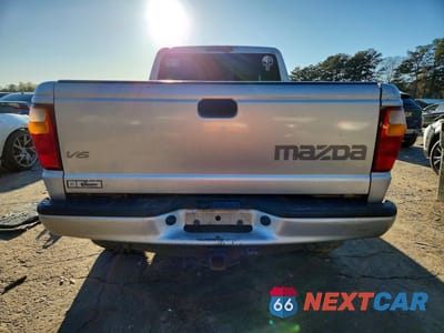 Zdjęcie 6 z 12 samochodu: 2004 MAZDA B3000 CAB PLUS VIN:4F4YR16UX4TM00815 - miniatura
