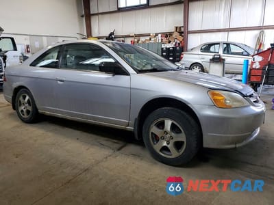 Czwarte zdjęcie samochodu z boku: 2002 HONDA CIVIC LX VIN:1HGEM21592L808009 - miniatura