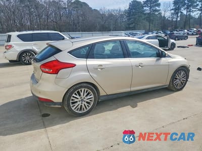 Trzecie zdjęcie samochodu z tyłu: 2018 FORD FOCUS TITANIUM VIN:1FADP3N27JL237907 - miniatura