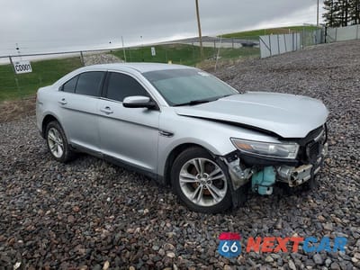 Czwarte zdjęcie samochodu z boku: 2015 FORD TAURUS SEL VIN:1FAHP2H86FG194947 - miniatura