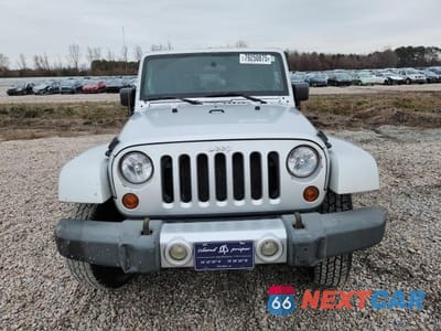 Piąte zdjęcie samochodu w środku: 2008 JEEP WRANGLER SAHARA VIN:1J8FA54128L589692 - miniatura