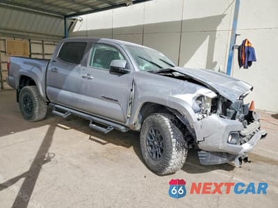 Czwarte zdjęcie samochodu z boku: 2022 TOYOTA TACOMA SR5 V6 VIN:3TMAZ5CN3NM167701 - miniatura
