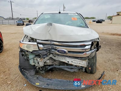 Piąte zdjęcie samochodu w środku: 2011 FORD EDGE SEL VIN:2FMDK3JC1BBB14317 - miniatura