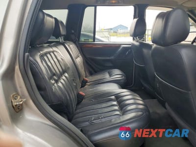 Zdjęcie 11 z 13 samochodu: 1999 JEEP GRAND CHEROKEE LIMITED VIN:1J4GW68N1XC671972 - miniatura