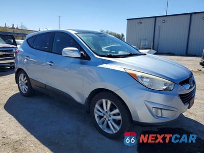 Czwarte zdjęcie samochodu z boku: 2011 HYUNDAI TUCSON LIMITED VIN:KM8JU3AC2BU275721 - miniatura