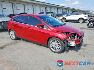 Czwarte zdjęcie samochodu z boku: 2012 FORD FOCUS SEL VIN:1FAHP3M28CL293960 - miniatura