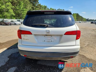 Zdjęcie 6 z 12 samochodu: 2018 HONDA PILOT LX VIN:5FNYF5H17JB031728 - miniatura