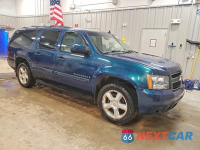 Czwarte zdjęcie samochodu z boku: 2007 CHEVROLET SUBURBAN K1500 VIN:3GNFK16327G116051 - miniatura