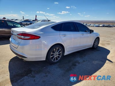 Trzecie zdjęcie samochodu z tyłu: 2017 FORD FUSION SE VIN:3FA6P0HD1HR312617 - miniatura