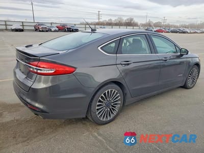 Trzecie zdjęcie samochodu z tyłu: 2017 FORD FUSION TITANIUM HEV VIN:3FA6P0RUXHR295850 - miniatura
