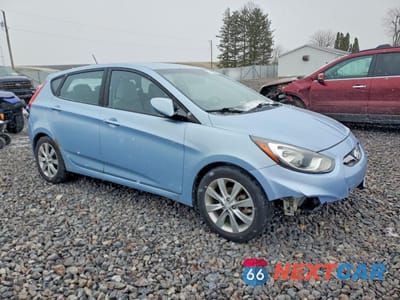 Czwarte zdjęcie samochodu z boku: 2012 HYUNDAI ACCENT SE VIN:KMHCU5AE2CU006450 - miniatura