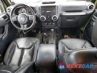 Zdjęcie 8 z 13 samochodu: 2013 JEEP WRANGLER UNLIMITED SAHARA VIN:1C4BJWEG8DL600722 - miniatura