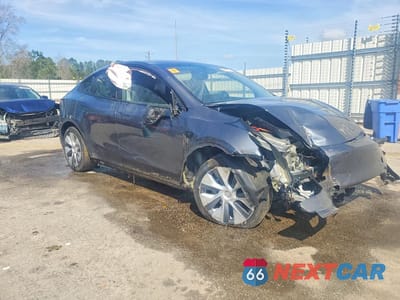 Czwarte zdjęcie samochodu z boku: 2023 TESLA MODEL Y VIN:7SAYGDEE7PA196525 - miniatura