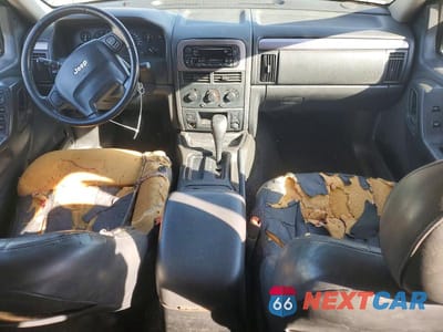 Zdjęcie 8 z 13 samochodu: 2003 JEEP GRAND CHEROKEE LAREDO VIN:1J8GX48S83C598146 - miniatura