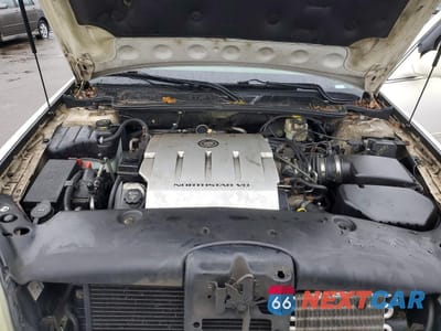 Zdjęcie 11 z 12 samochodu: 2004 CADILLAC DEVILLE VIN:1G6KD54Y94U159305 - miniatura