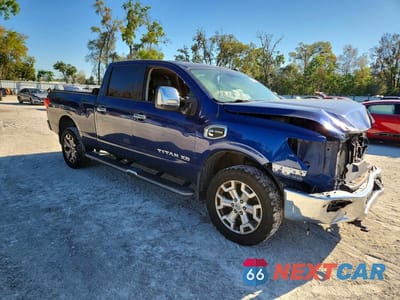 Czwarte zdjęcie samochodu z boku: 2016 NISSAN TITAN XD SL VIN:1N6BA1F27GN508920 - miniatura