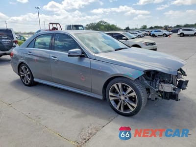 Czwarte zdjęcie samochodu z boku: 2014 MERCEDES-BENZ E 350 VIN:WDDHF5KBXEA889409 - miniatura