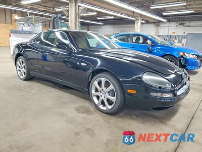 Czwarte zdjęcie samochodu z boku: 2003 MASERATI COUPE GT VIN:ZAMBC38A930009066 - miniatura