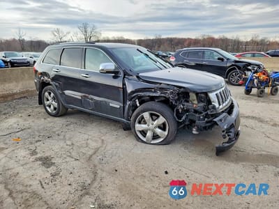 Czwarte zdjęcie samochodu z boku: 2011 JEEP GRAND CHEROKEE LIMITED VIN:1J4RR5GT7BC552293 - miniatura