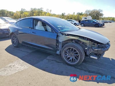 Czwarte zdjęcie samochodu z boku: 2024 TESLA MODEL 3 VIN:5YJ3E1EB5RF762009 - miniatura