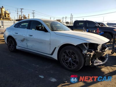 Czwarte zdjęcie samochodu z boku: 2024 BMW I4 EDRIVE 35 VIN:WBY43AW07RFS91983 - miniatura