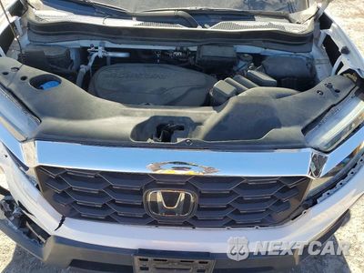 Zdjęcie 12 z 13 samochodu: 2022 HONDA PASSPORT EXL VIN:5FNYF7H50NB005542 - miniatura