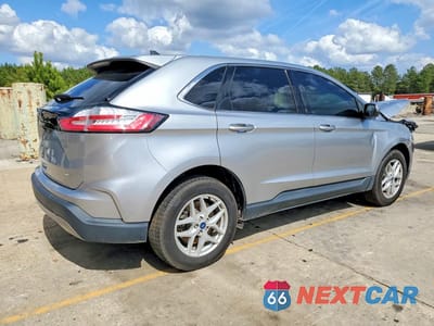 Trzecie zdjęcie samochodu z tyłu: 2022 FORD EDGE SEL VIN:2FMPK4J90NBA34096 - miniatura