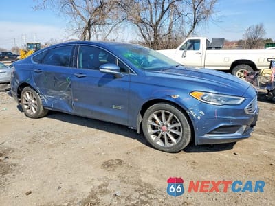 Czwarte zdjęcie samochodu z boku: 2018 FORD FUSION SE PHEV VIN:3FA6P0PU9JR199703 - miniatura