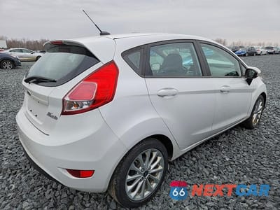 Trzecie zdjęcie samochodu z tyłu: 2014 FORD FIESTA SE VIN:3FADP4EJ3EM103624 - miniatura