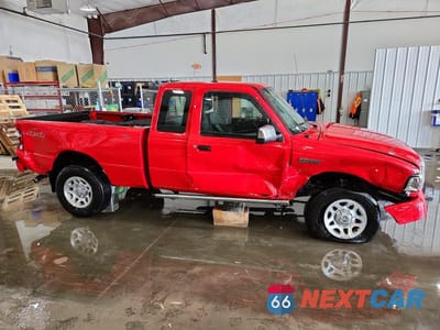 Czwarte zdjęcie samochodu z boku: 2011 FORD RANGER SUPER CAB VIN:1FTLR4FEXBPA35250 - miniatura