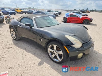 Czwarte zdjęcie samochodu z boku: 2006 PONTIAC SOLSTICE VIN:1G2MB33B06Y110054 - miniatura