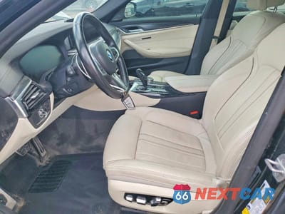 Zdjęcie 7 z 11 samochodu: 2021 BMW M550XI VIN:WBA13BK03MCG26571 - miniatura