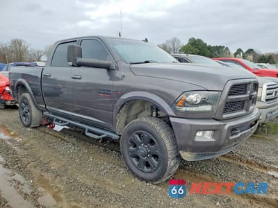 Czwarte zdjęcie samochodu z boku: 2016 RAM 2500 LARAMIE VIN:3C6UR5FJ3GG199885 - miniatura