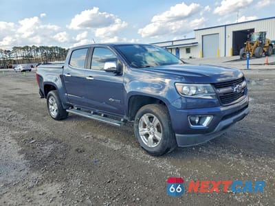 Czwarte zdjęcie samochodu z boku: 2018 CHEVROLET COLORADO Z71 VIN:1GCGSDEN1J1325059 - miniatura