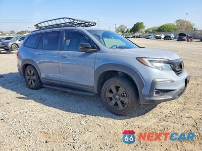 Czwarte zdjęcie samochodu z boku: 2022 HONDA PILOT TRAILSPORT VIN:5FNYF6H8XNB021378 - miniatura