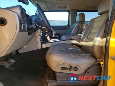 Zdjęcie 7 z 13 samochodu: 2003 HUMMER H2 VIN:5GRGN23U63H107830 - miniatura