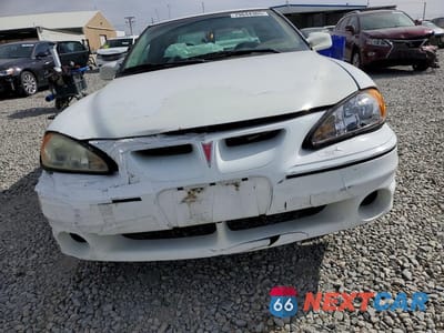 Piąte zdjęcie samochodu w środku: 2000 PONTIAC GRAND AM GT VIN:1G2NW52E3YM747577 - miniatura