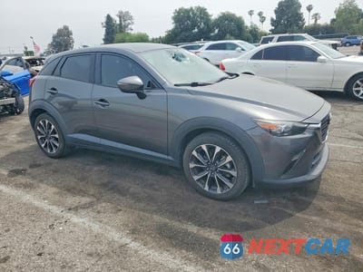 Czwarte zdjęcie samochodu z boku: 2019 MAZDA CX-3 TOURING VIN:JM1DKFC77K0414287 - miniatura