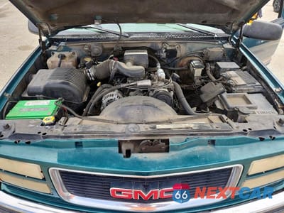 Zdjęcie 12 z 12 samochodu: 1996 GMC SUBURBAN K1500 VIN:1GKFK16R2TJ733816 - miniatura