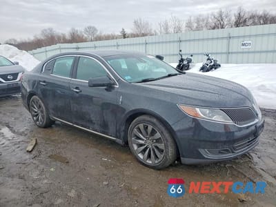 Czwarte zdjęcie samochodu z boku: 2015 LINCOLN MKS VIN:1LNHL9DK1FG600340 - miniatura