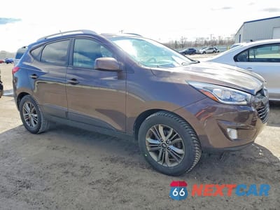 Czwarte zdjęcie samochodu z boku: 2015 HYUNDAI TUCSON SE VIN:KM8JUCAGXFU972112 - miniatura