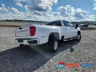 Czwarte zdjęcie samochodu z boku: 2022 CHEVROLET SILVERADO K3500 HIGH COUNTRY VIN:1GC4YVE79NF100471 - miniatura