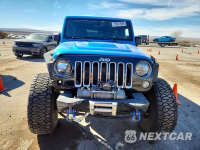 Piąte zdjęcie samochodu w środku: 2014 JEEP WRANGLER UNLIMITED SAHARA VIN:1C4BJWEG0EL168998 - miniatura