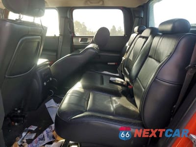 Zdjęcie 10 z 11 samochodu: 2009 HUMMER H2 SUT LUXURY VIN:5GRGN02209H103026 - miniatura