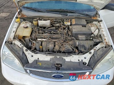 Zdjęcie 11 z 12 samochodu: 2005 FORD FOCUS ZX5 VIN:3FAHP37N25R122177 - miniatura