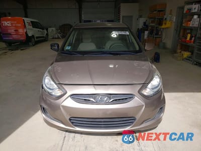 Piąte zdjęcie samochodu w środku: 2014 HYUNDAI ACCENT GLS VIN:KMHCT4AE2EU719655 - miniatura